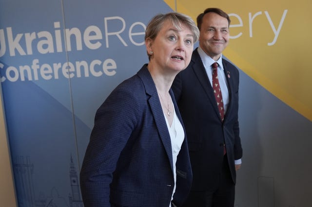 Yvette Cooper on a visit to Poland