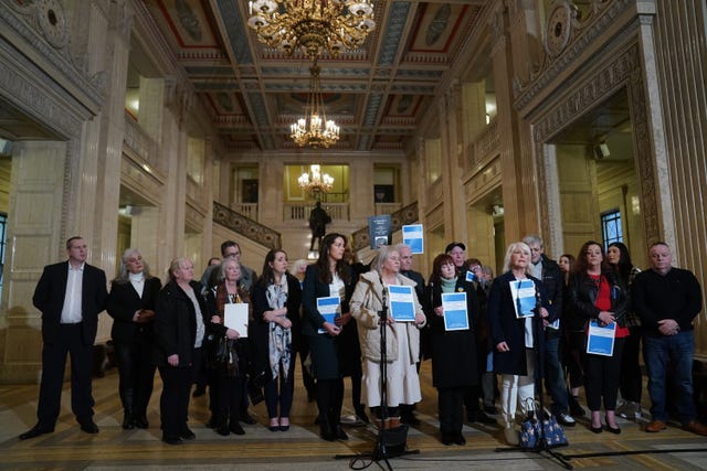 Margaret McGuckin, front right, of victims’ group Savia, speaks to the media in the Great Hall at Stormont after proceedings where the long-awaited public apology to the victims of historical institutional abuse was given 