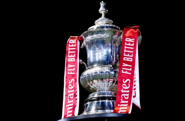 The FA Cup trophy on display ahead of the first round match between Tamworth and Huddersfield