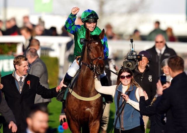 Ga Law and jockey Jonathan Burke after winning the Paddy Power Gold Cup