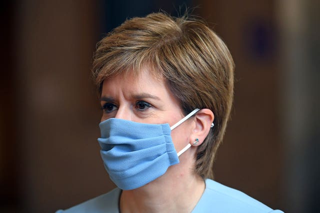 Nicola Sturgeon wearing a mask