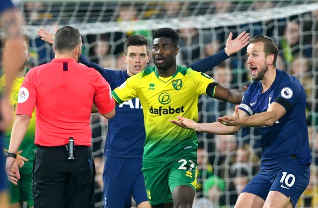 Tottenham captain Harry Kane, right, appeals to referee Kevin Friend during the 2-2 draw at Norwich
