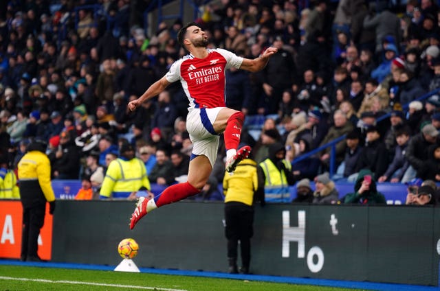 Arsenal’s Mikel Merino jumps in the air in the corner by the Gunners fans after scoring his second goal