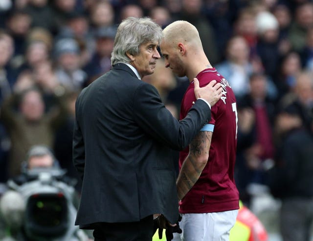 West Ham boss Manuel Pellegrini, left, was reluctant to sell Marko Arnautovic (Yui Mok/PA)