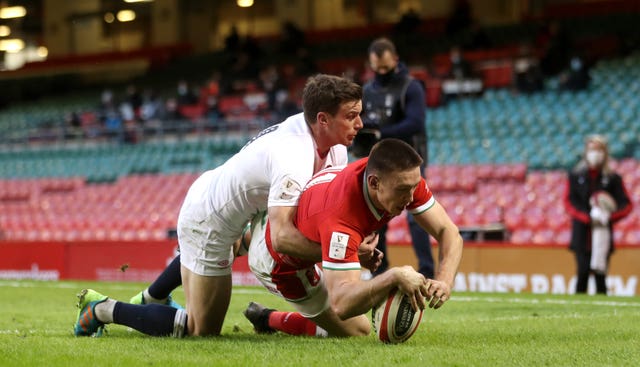 Wales' Josh Adams dives in to score the first try 