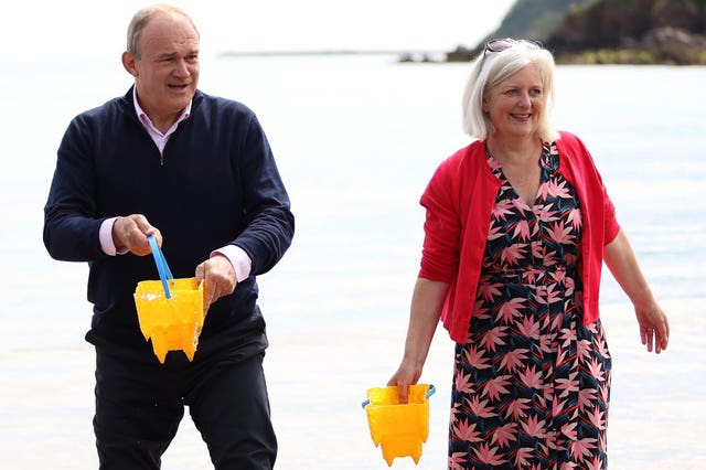Liberal Democrats leader Sir Ed Davey with parliamentary candidate for South Devon Caroline Voaden at Broadsands Beach, Paignton, Devon, while on the General Election campaign trail 