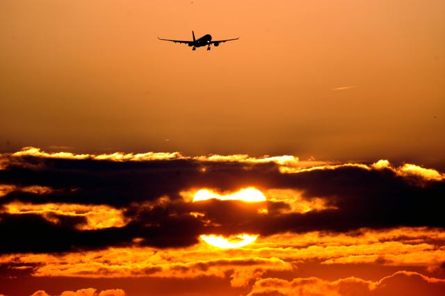 Plane comes in to land at Heathrow