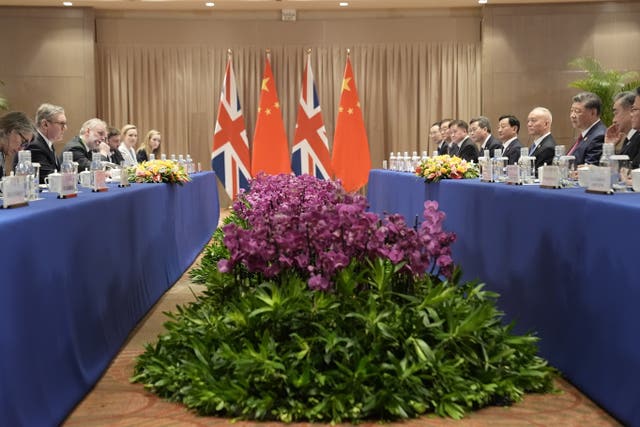 A meeting at the G20 summit with UK and Chinese leaders at a large table