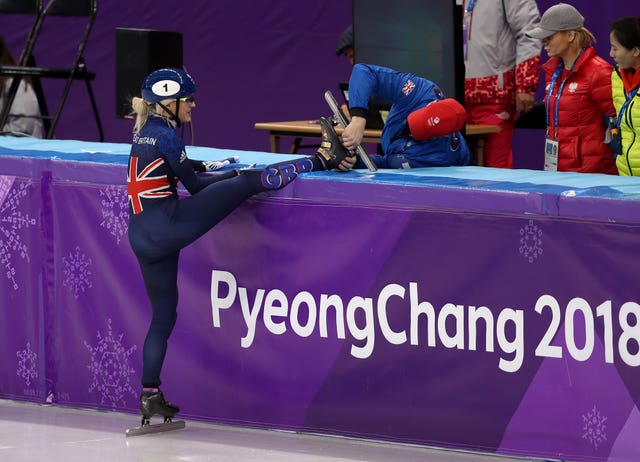 Elise Christie required help from a British official before re-starting her 1000m heat