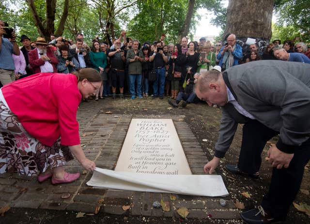 The unveiling of a headstone for William Blake at Bunhill Fields in London
