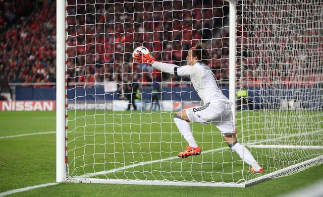 Benfica goalkeeper Mile Svilar concedes a goal in the Champions League against Manchester United