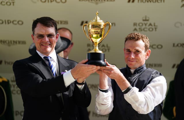 Aidan O’Brien (left) and Ryan Moore hold up the Ascot Gold Cup 