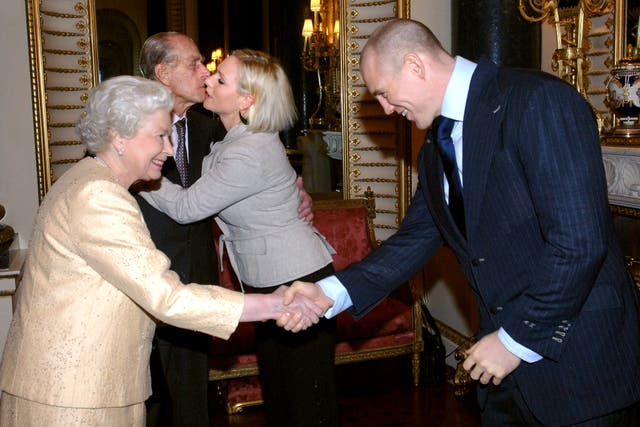 Queen hosts reception for year’s top achievers