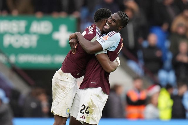 Aston Villa’s Amadou Onana (right) and Jhon Duran give each other a hug after the victory over Manchester City 