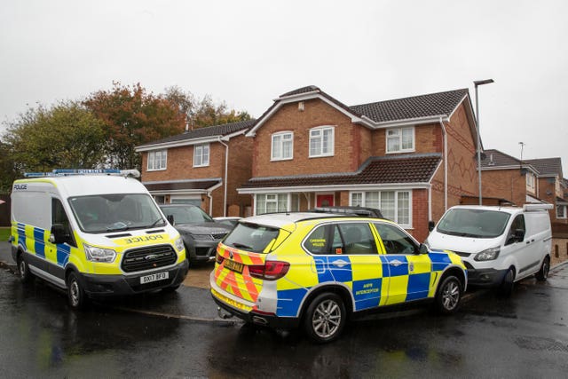 Police outside the house of Joanna and Thomas Maher in Warrington