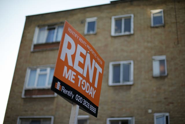 A letting agent sign displaying ‘rent me today’ outside flats in north London