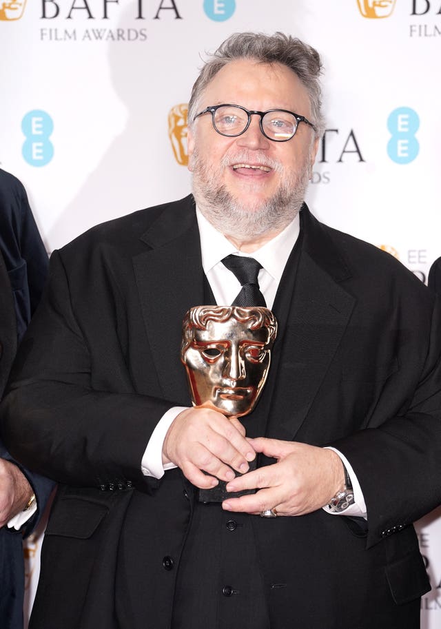Guillermo del Toro with the best animated film Bafta for Pinocchio