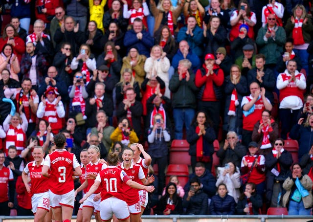 Arsenal kept their title hopes alive with a 5-1 victory in the north London derby (John Walton/PA)