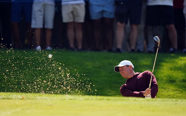 Rory McIlroy plays out of a bunker