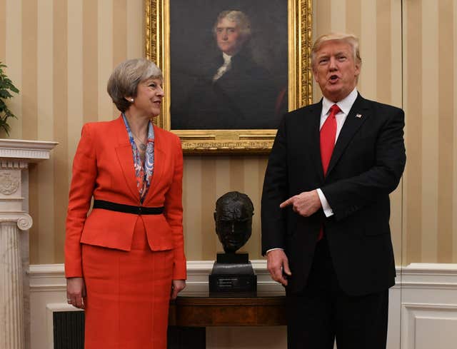 Then prime minister Theresa May meeting then US president Donald Trump by a bust of Sir Winston Churchill in the Oval Office (Stefan Rousseau/PA)