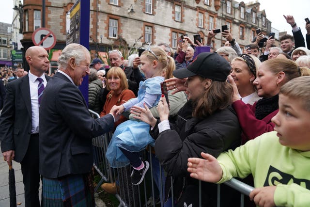 King Charles III meets the public on a walk about after attending an official council meeting at the City Chambers in Dunfermline, Fife, to formally mark the conferral of city status on the former town, ahead of a visit to Dunfermline Abbey to mark its 950th anniversary
