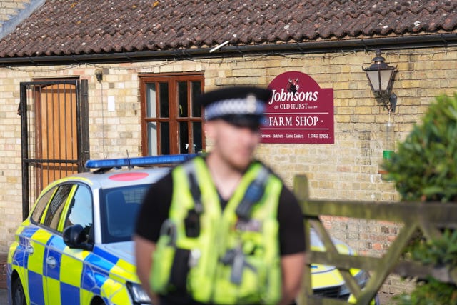 Police at Johnson’s of Old Hurst, where the child was injured