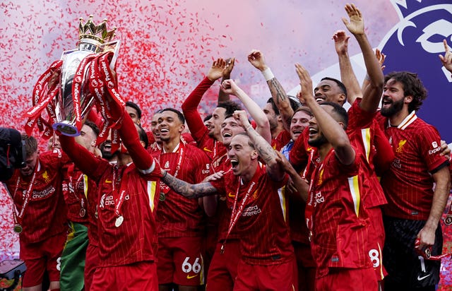 Liverpool captain Virgil Van Dijk lifts the Premier League trophy