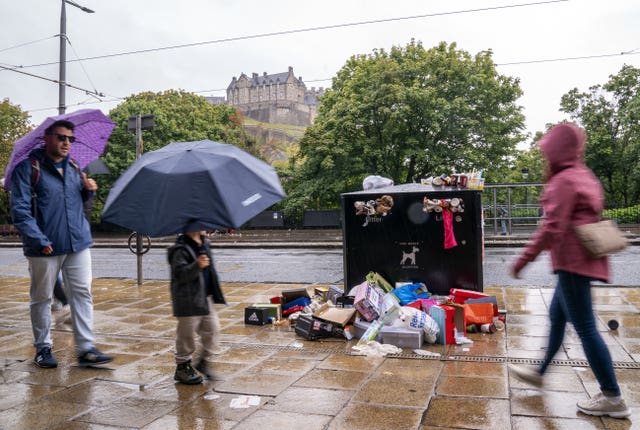 Bins overflowing with litter along Princes Street in Edinburgh city centre
