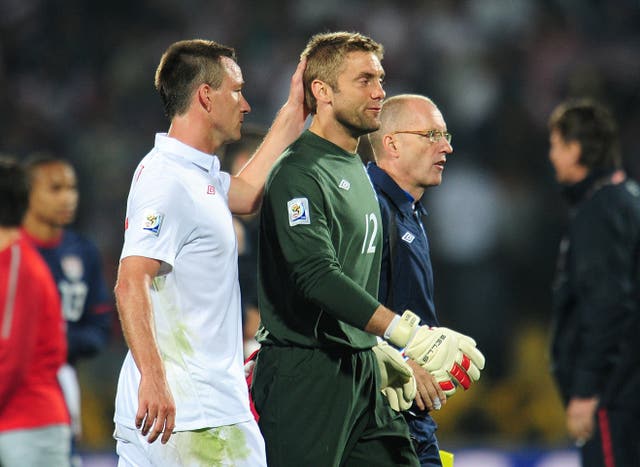 John Terry with goalkeeper Robert Green after England's 1-1 draw with the USA at the 2010 World Cup in South Africa