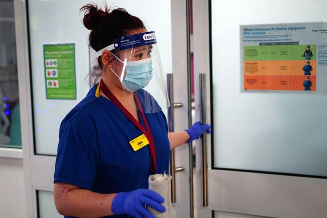 A nurse wearing PPE in a ward for covid patients at King’s College Hospital, in south east London