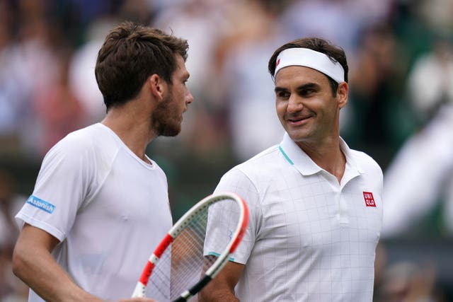 Cameron Norrie (left) faced Roger Federer at Wimbledon this summer