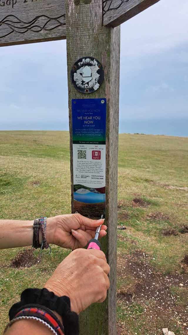 A plaque at Seven Sisters being reinstated