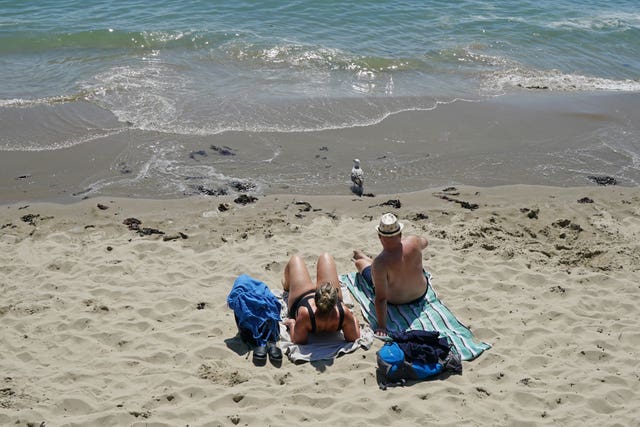 People Sunny Sands beach in Folkestone, Ken