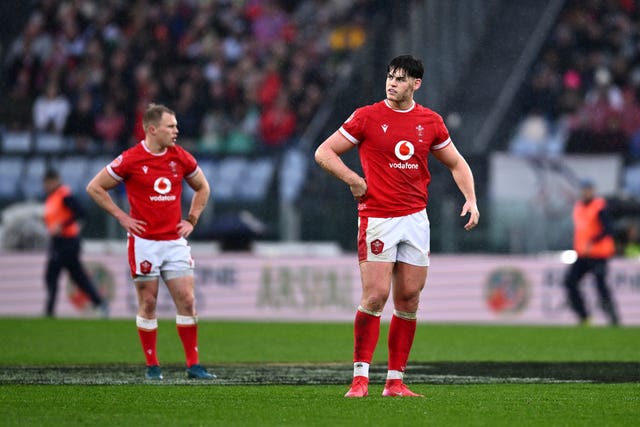 Wales players react