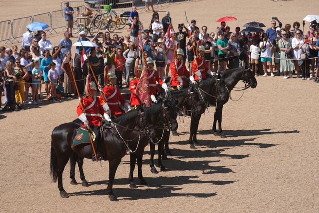 Canadian mounted soldiers on a line of horses 