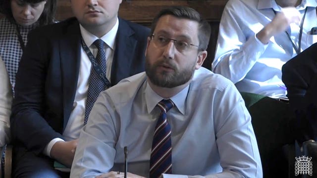 Simon Case, Cabinet Secretary and head of the Civil Service, Cabinet Office, answering questions in front of the Public Administration and Constitutional Affairs Select Committee at the House of Commons, London, on the subject of the work of the Cabinet Office