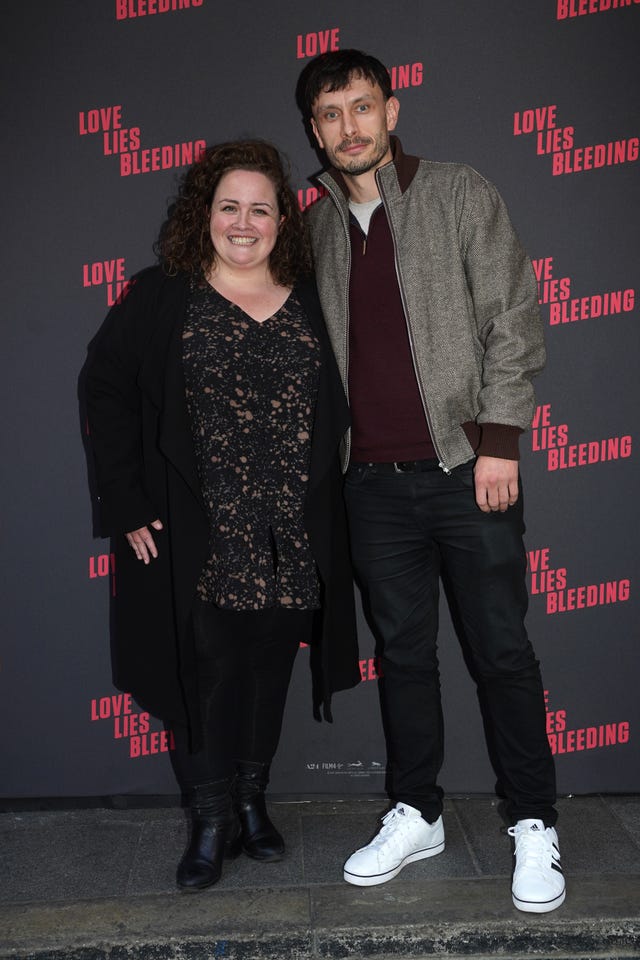 A man and a woman standing together 