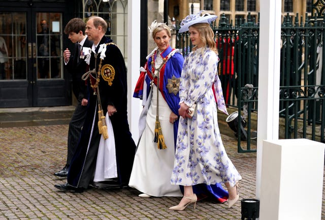 The Duke and Duchess of Edinburgh in their robes arriving with their daughter Lady Louise Windsor (right) and son the Earl of Wessex (left) for the King's coronation 