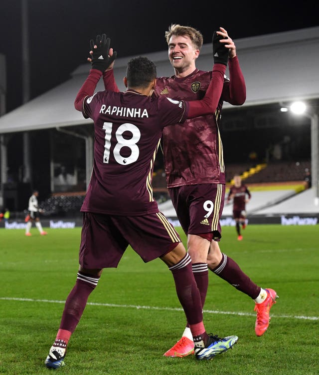 Raphinha, left, celebrates his goal with Patrick Bamford