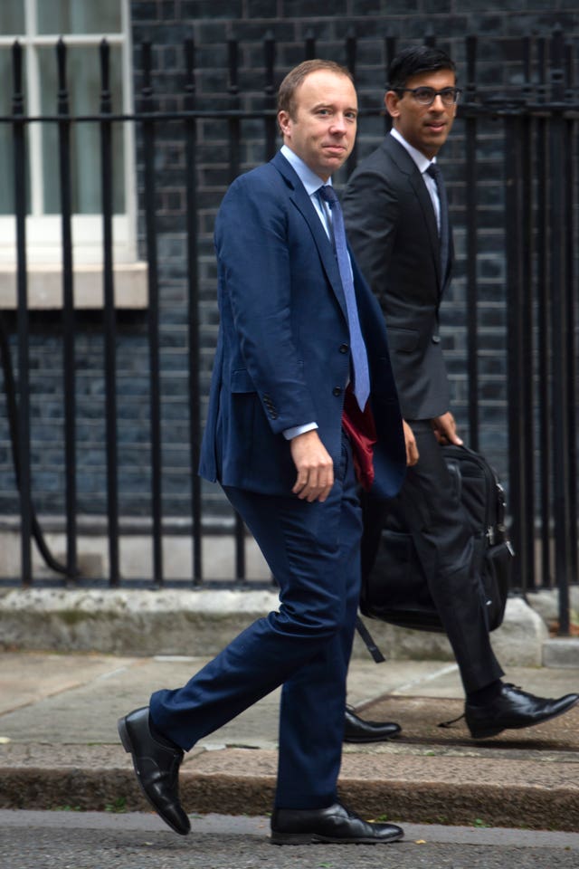 Matt Hancock, left, and Rishi Sunak arriving at No 10