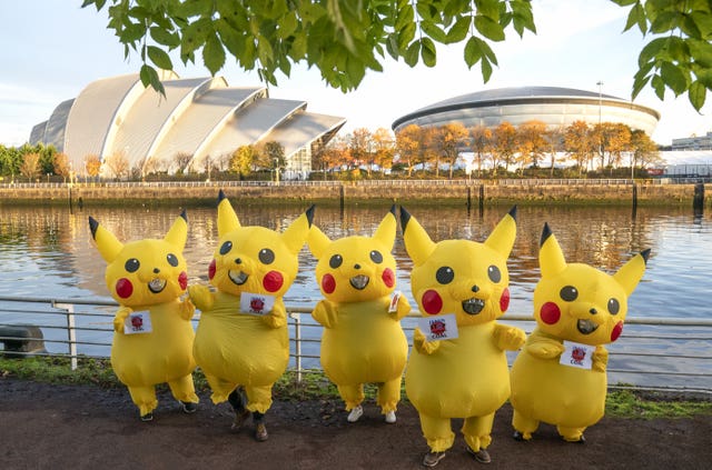 CoLife-sized ‘Pikachus’ characters joined activists from the No Coal Japan coalition, at Pacific Quay opposite the Glasgow COP26 campus