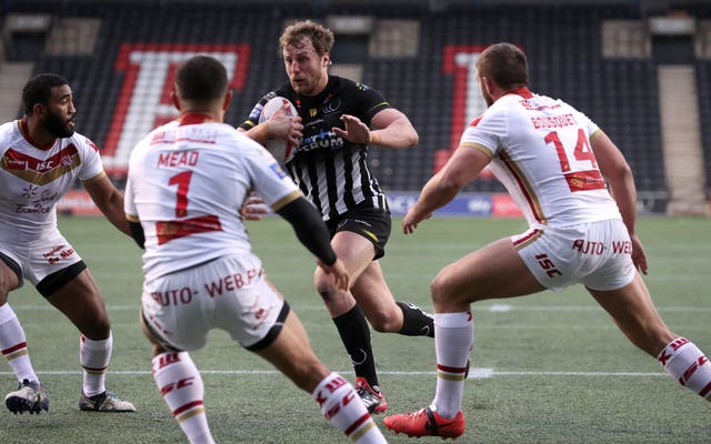 Chris Dean drives to the line to score one of two tries 