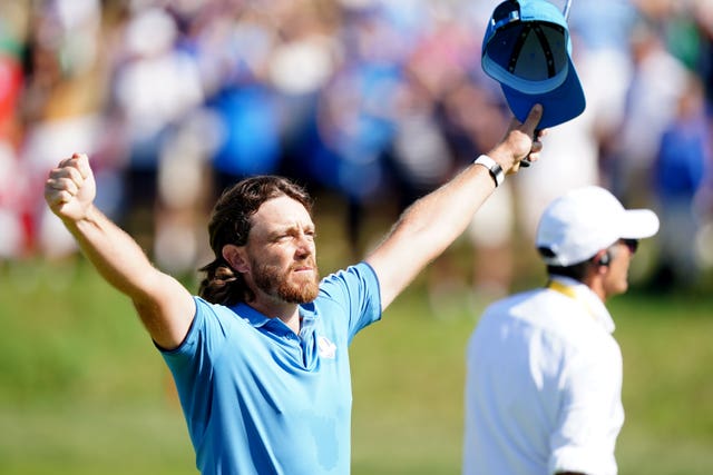 Tommy Fleetwood celebrates his victory on day one