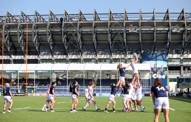 Scotland and England players contest a line out