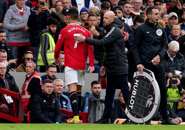 Cristiano Ronaldo, left, with manager Erik ten Hag after being substituted against Newcastle