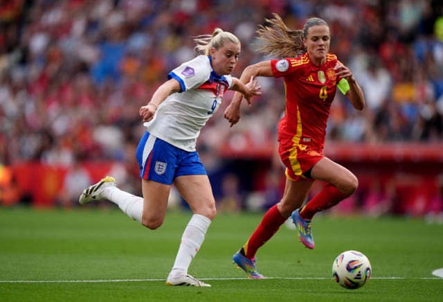 Alessia Russo, left, fights for the ball with Irene Paredes