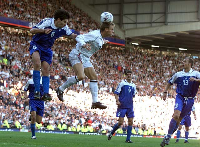 England's Teddy Sheringham scores against Greece to keep alive their hopes of topping Group Nine