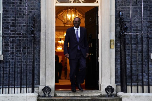 Newly installed Chancellor of the Exchequer Kwasi Kwarteng leaving Downing Street 