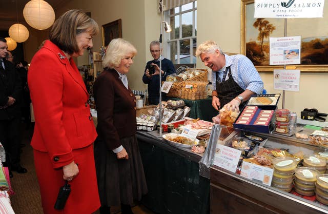 Duchess of Cornwall attends Bowood House Christmas Extravaganza