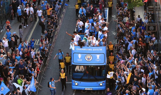 City's players toured Manchester on an open-top bus
